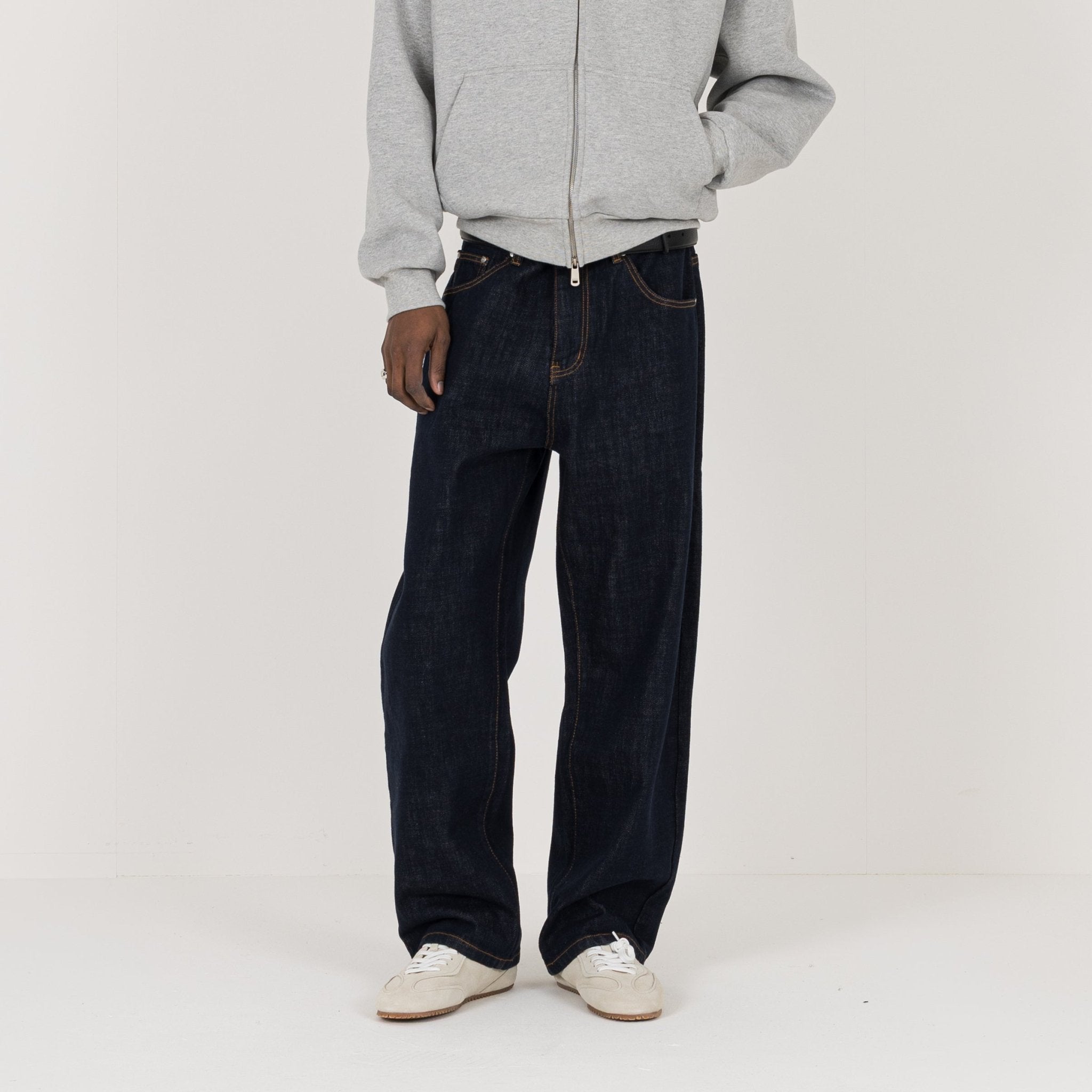 Model view of Destructive Relaxed Denim Raw Jeans